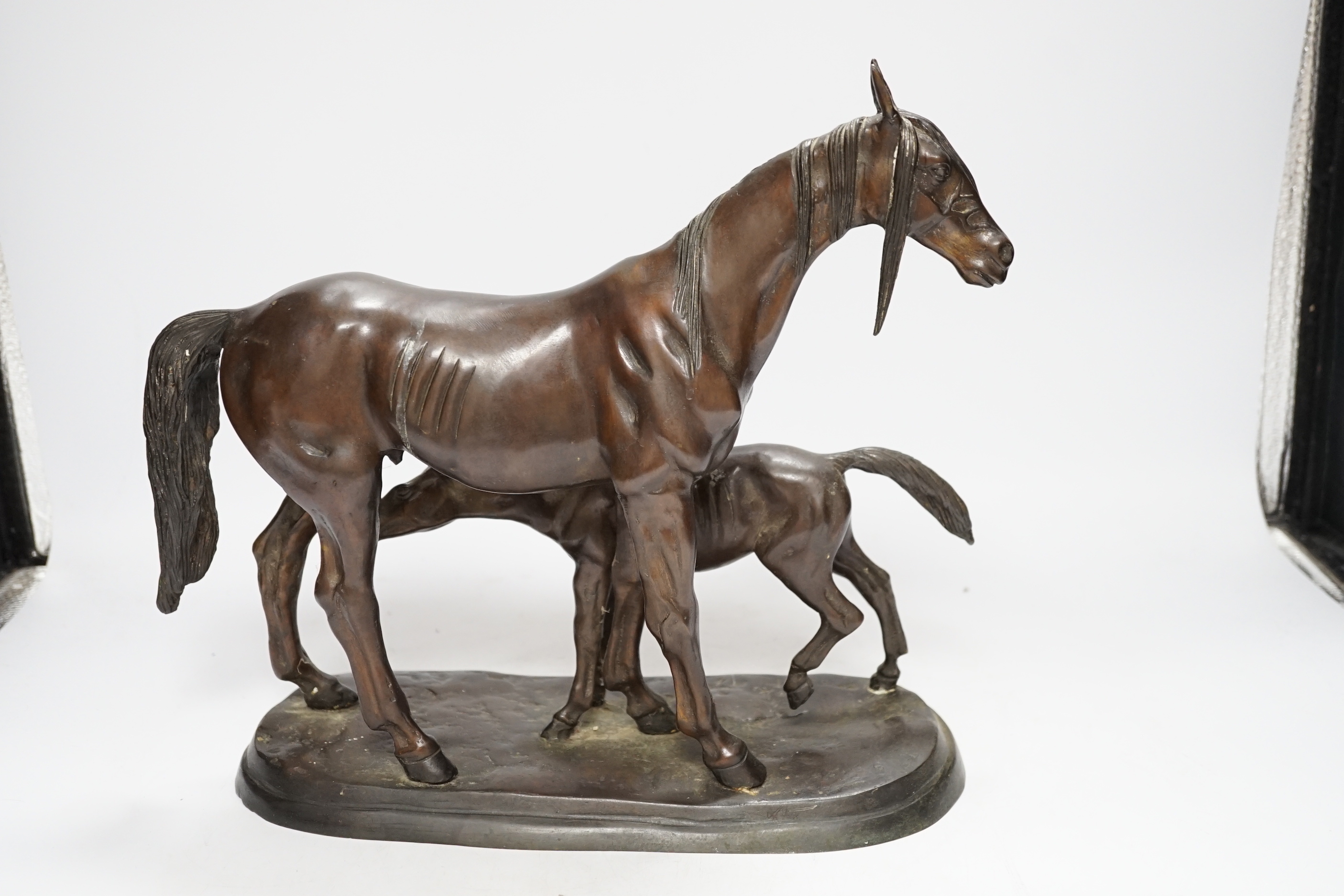 A modern bronze mare and foal, 32cm long